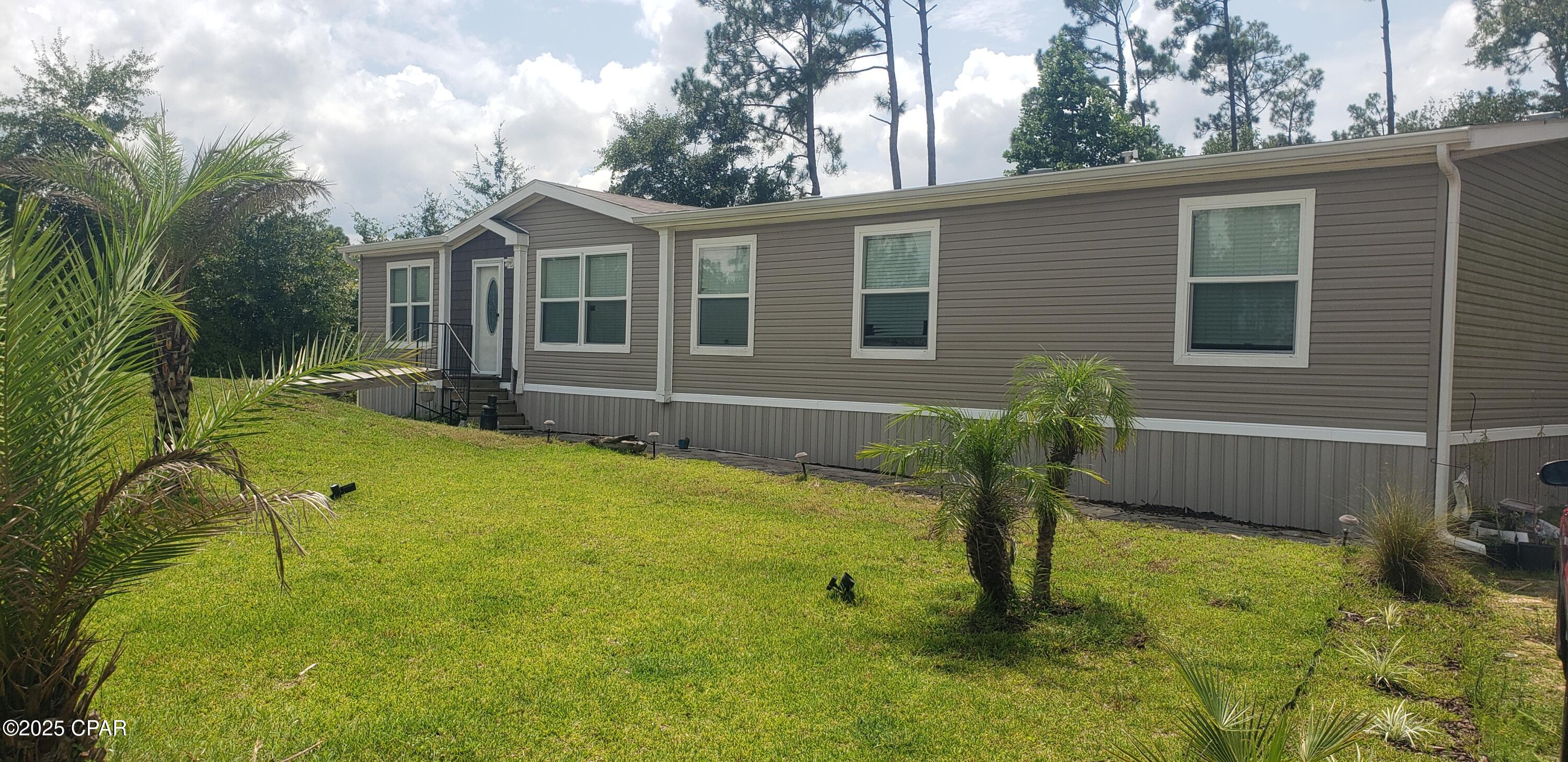 9125 Merlin Dr, Youngstown, FL 32466 photo