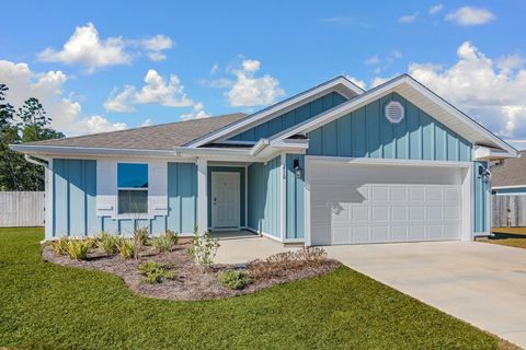Single Family Residence in Freeport FL 410 Sweet Blossom Bend Bnd.jpg