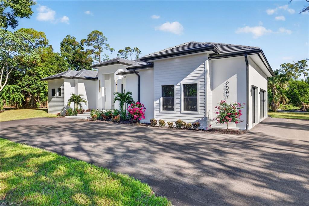 2997 64 St, Naples, FL 34105 photo