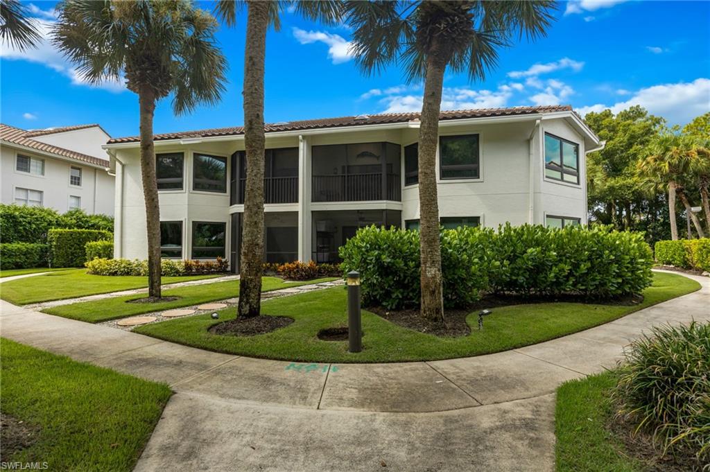 792 Eagle Creek Dr #203, Naples, FL 34113 photo