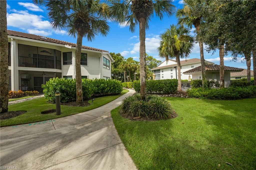792 Eagle Creek Dr #203, Naples, FL 34113 photo