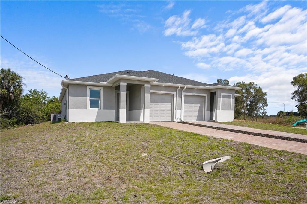 1147 Harvest Ave, Lehigh Acres, FL 33974 photo