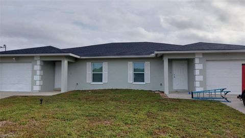 Duplex in LEHIGH ACRES FL 1405/1407 Hightower AVE.jpg