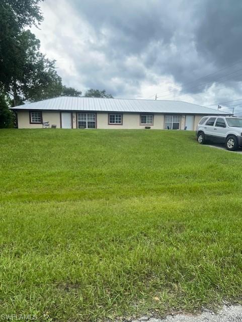 3017 3019 Gilbert Ave, Lehigh Acres, FL 33973