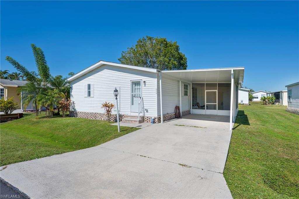 276 Grosbeak Ln, Naples, FL 34114