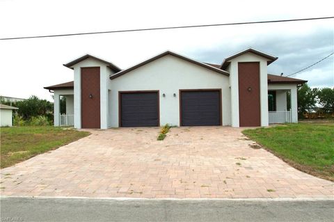 Townhouse in LEHIGH ACRES FL 2406/2404 Hawalaska ST.jpg