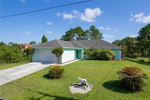 Single Family Residence in LEHIGH ACRES FL 1227 Cloplon ST.jpg