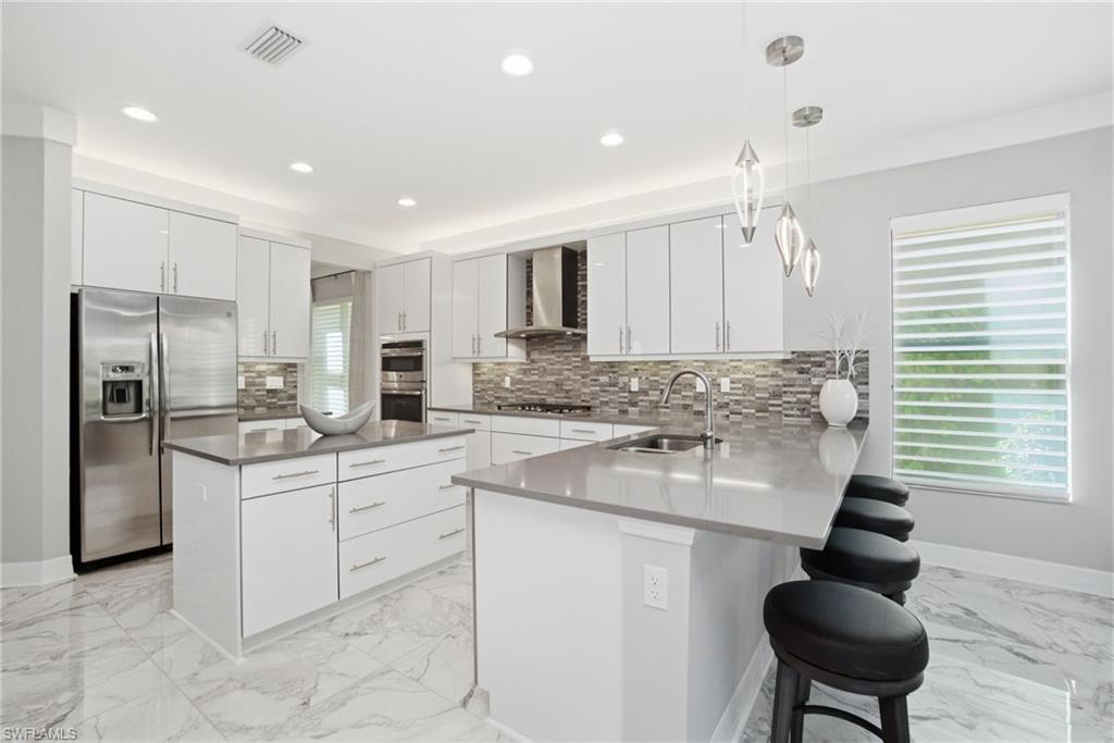 4654 Kensington Cir, Naples, FL 34119 photo