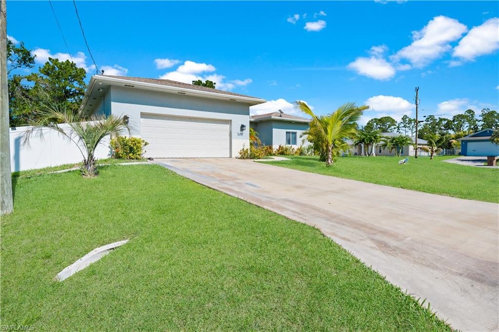 304 Bradley Ave, Lehigh Acres, FL 33974 photo