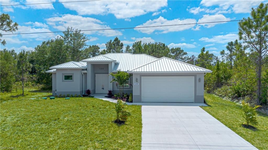 438 Raymer St, Lehigh Acres, FL 33974 photo