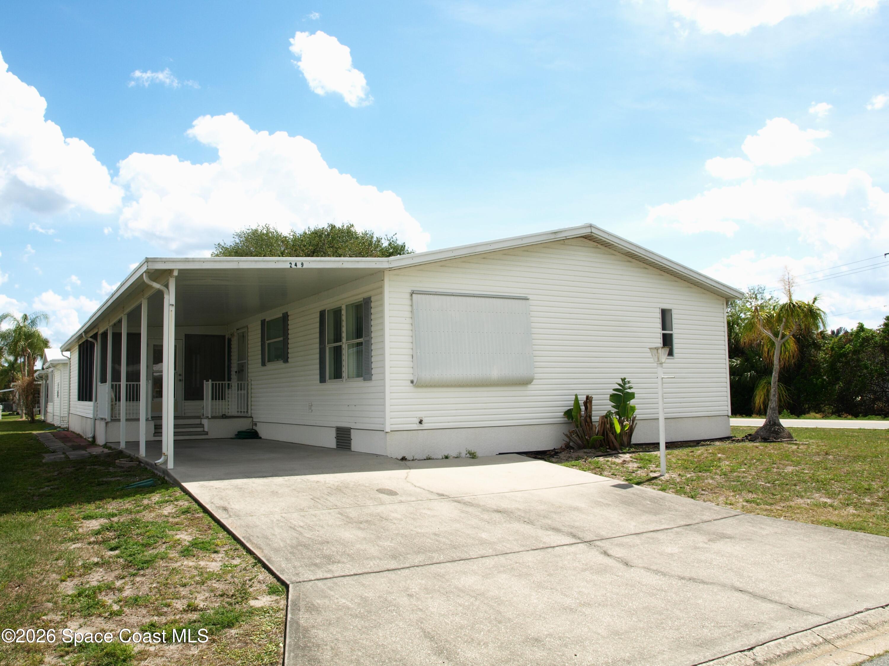 249 Kiwi Dr, Barefoot Bay, FL 32976 photo
