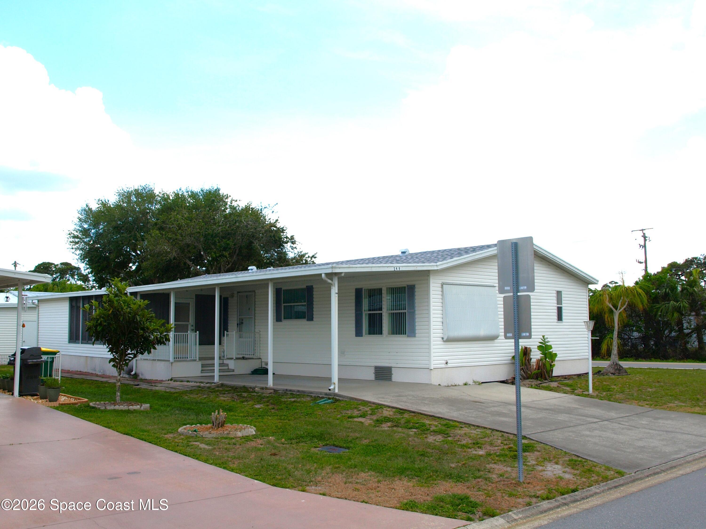 249 Kiwi Dr, Barefoot Bay, FL 32976 photo