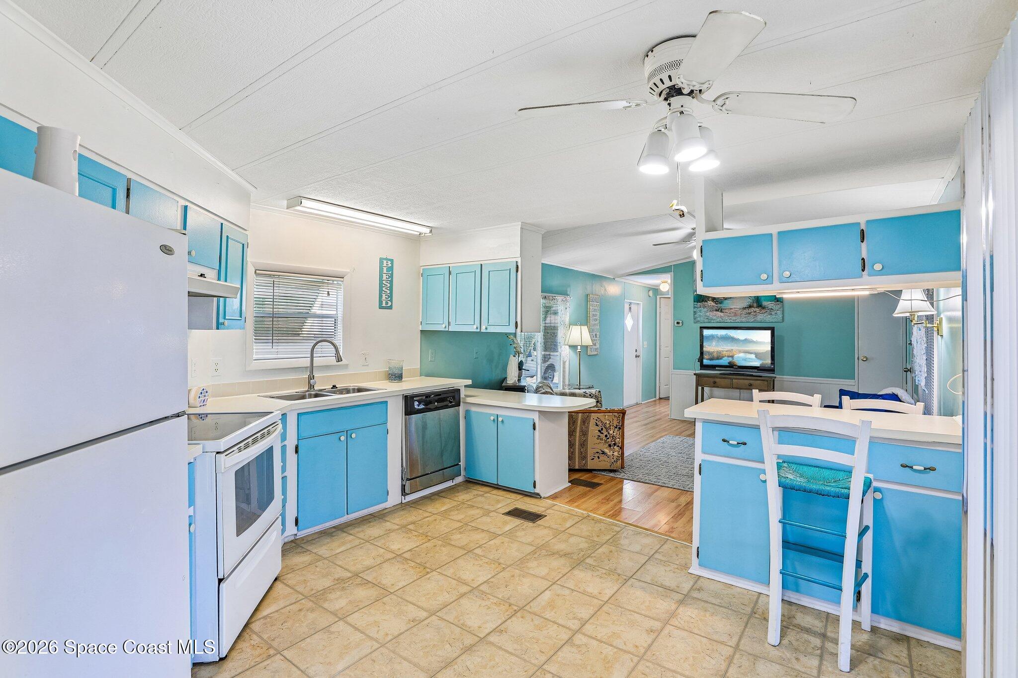 513 S Egret Cir, Barefoot Bay, FL 32976 photo