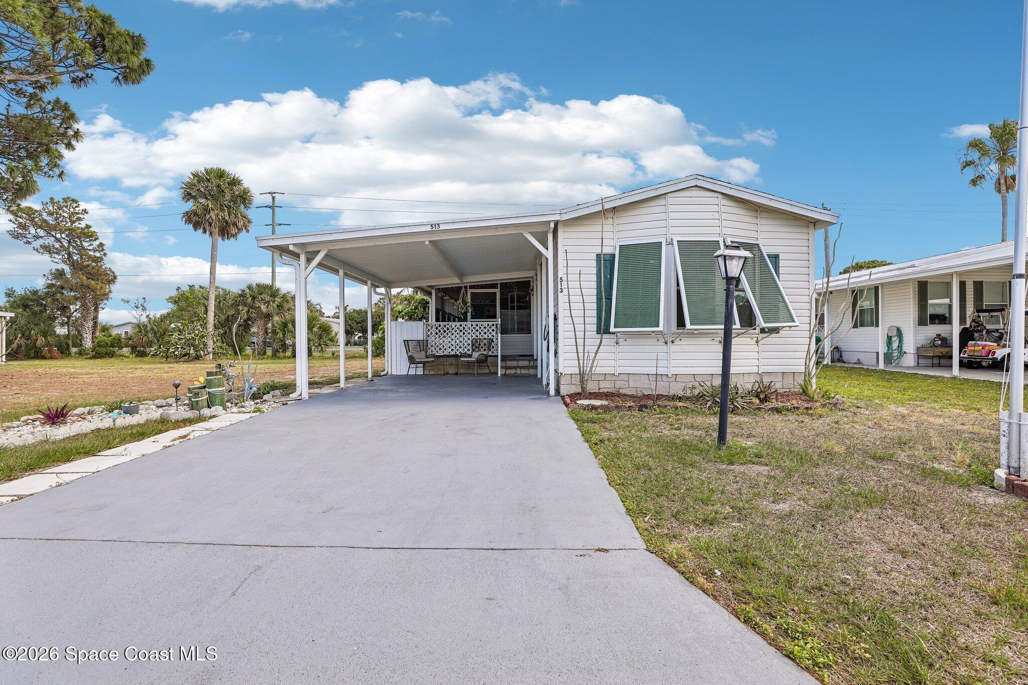 513 Egret Cir, Barefoot Bay, FL 32976
