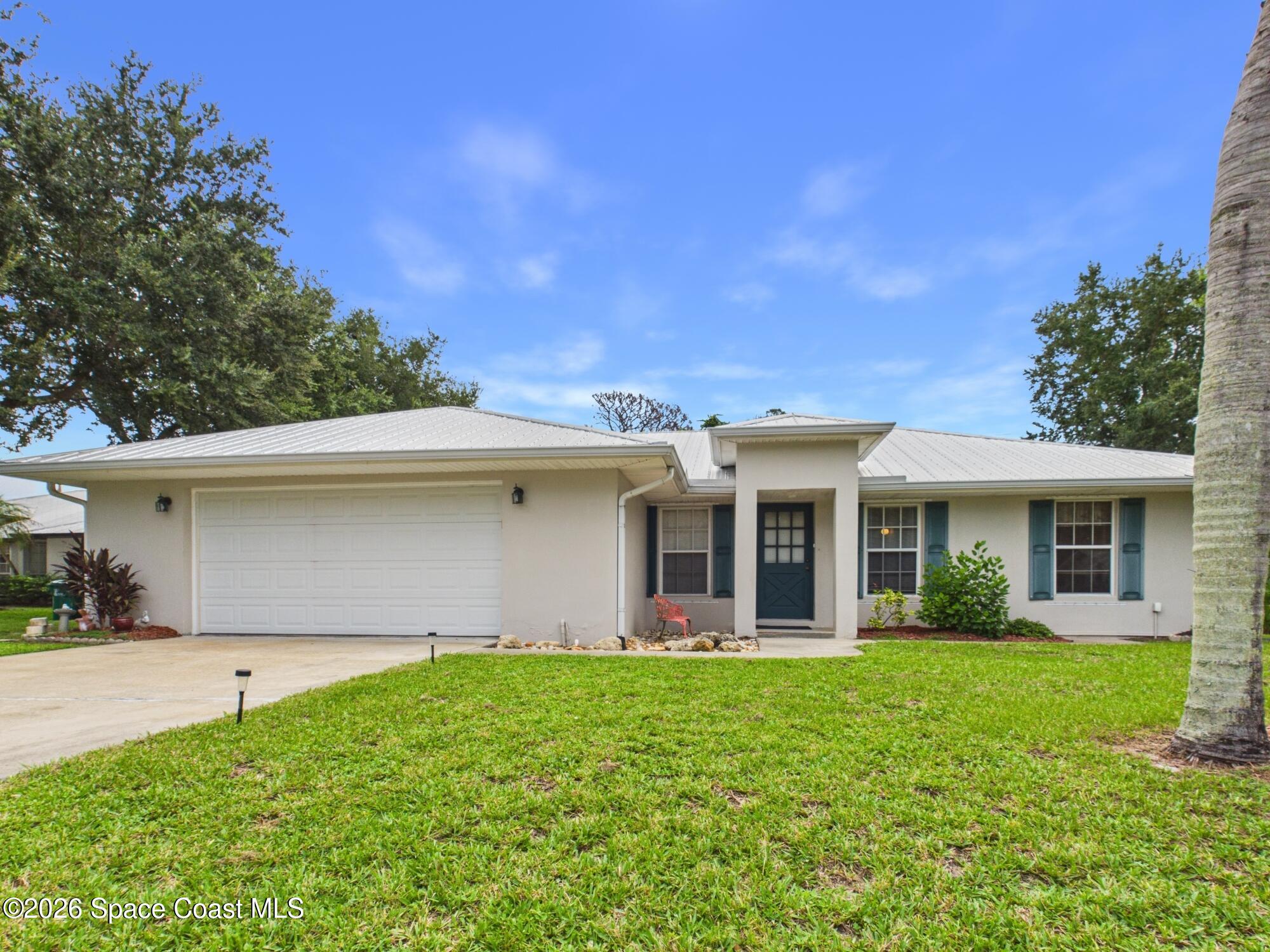 9545 Honeysuckle Dr, Micco, FL 32976 photo
