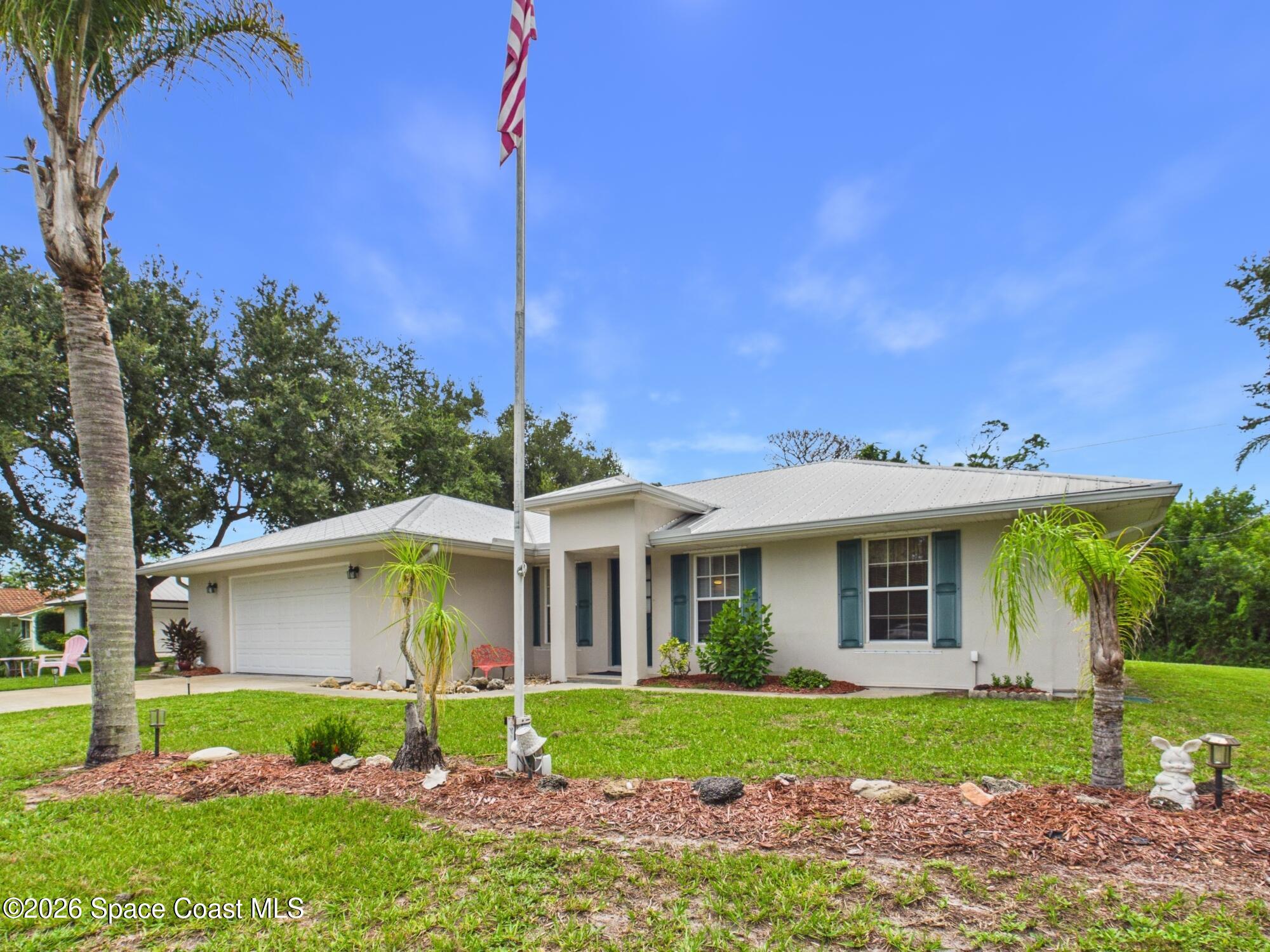 9545 Honeysuckle Dr, Micco, FL 32976 photo