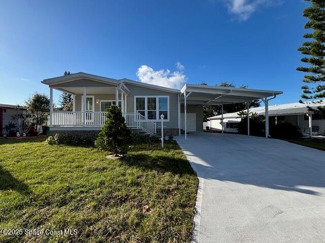 723 Hyacinth Cir, Barefoot Bay, FL 32976