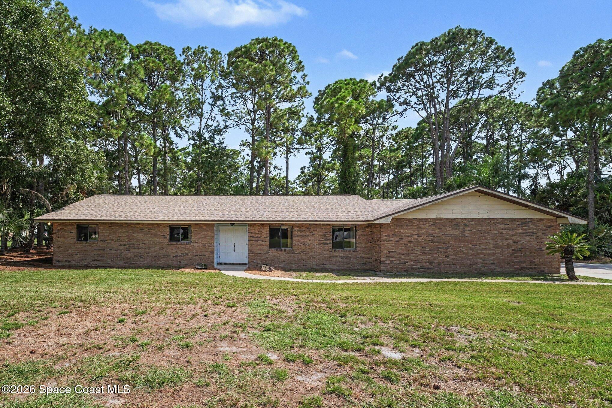 8001 Pine Needle Ln, West Melbourne, FL 32904 photo