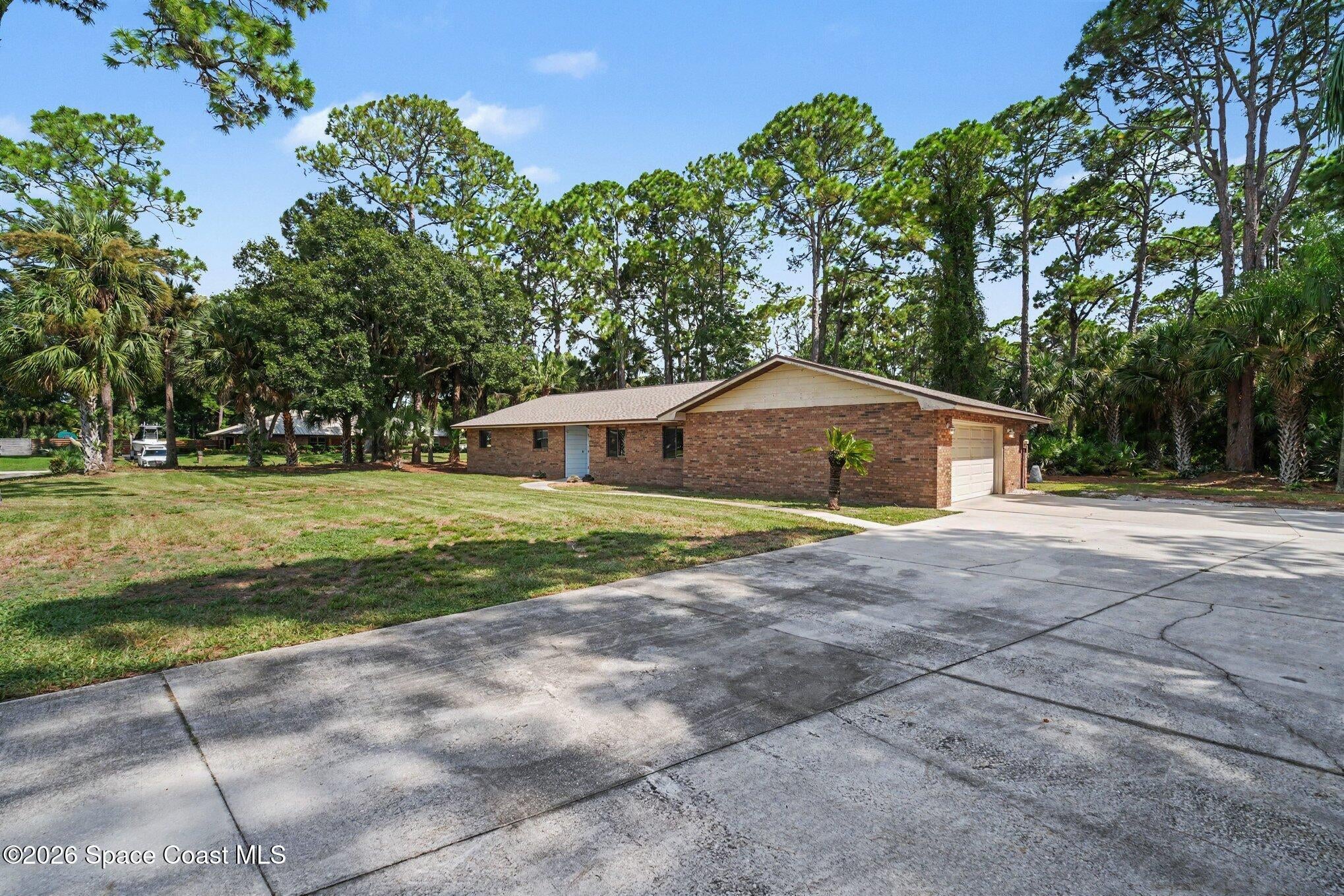 8001 Pine Needle Ln, West Melbourne, FL 32904 photo