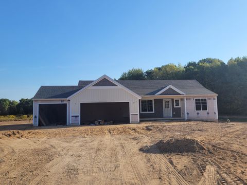 Single Family Residence in Tyrone Twp MI Lot 6 East Peach Ct.jpg