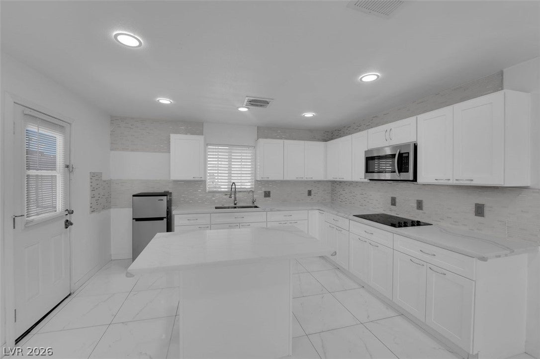 5856 Thurgood Ave, Las Vegas, NV 89122 photo