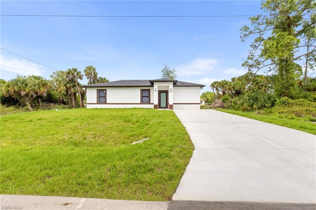 1137 Essex St, Lehigh Acres, FL 33974