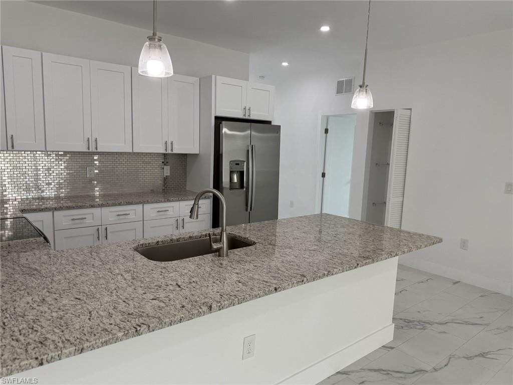 5253 5255 Centennial Blvd, Lehigh Acres, FL 33971 photo