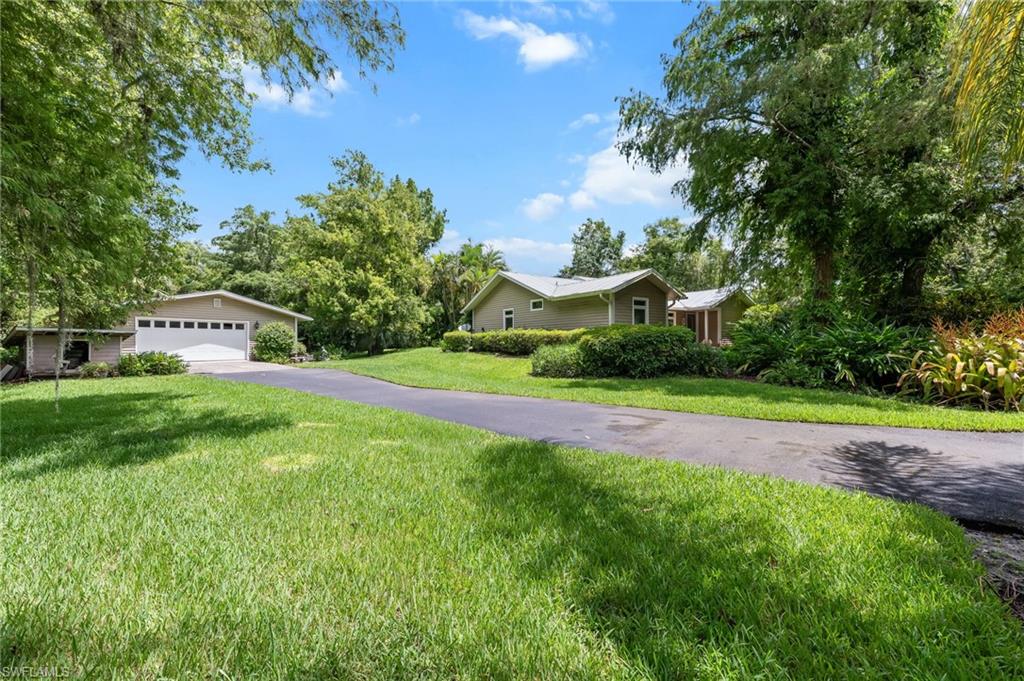 5247 Cherry Wood Dr, Naples, FL 34119 photo