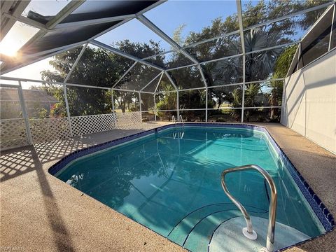 Single Family Residence in LEHIGH ACRES FL 1929 Golfside Village DR.jpg