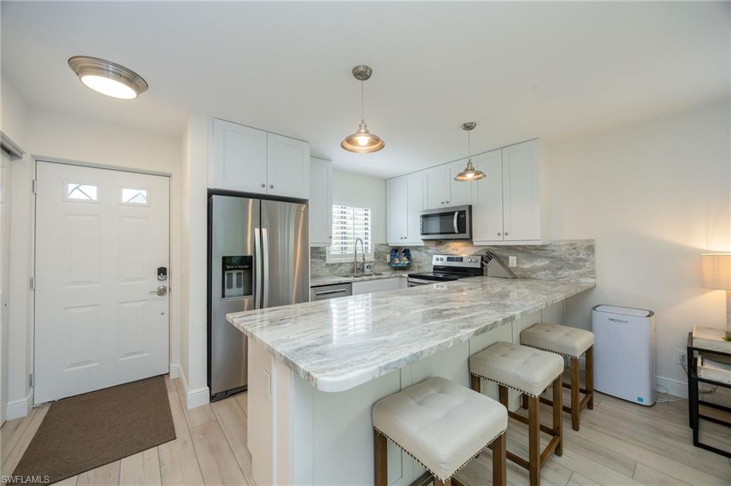 746 Eagle Creek Dr #101, Naples, FL 34113 photo
