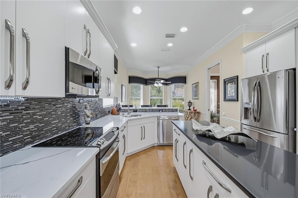 9097 Troon Lake Dr, Naples, FL 34109 photo