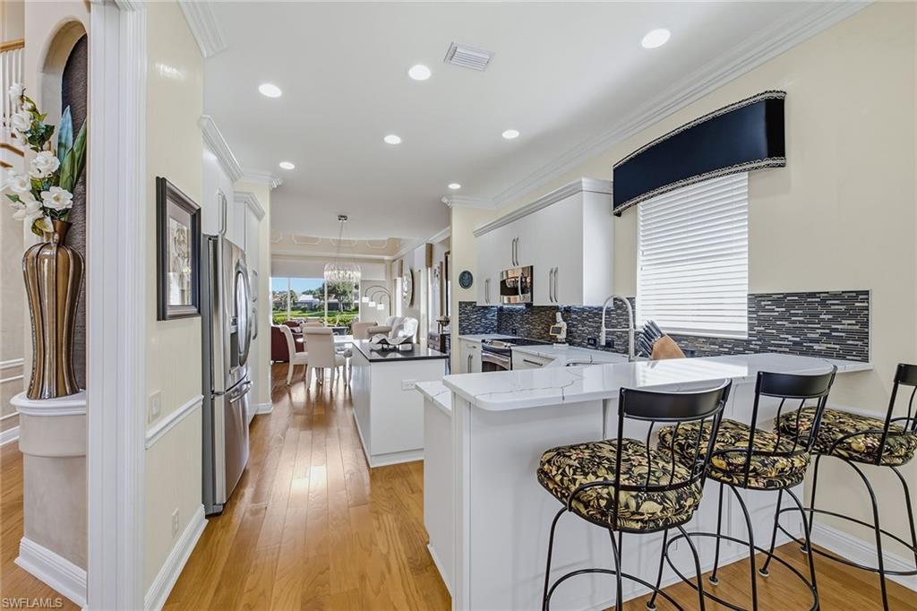 9097 Troon Lake Dr, Naples, FL 34109 photo