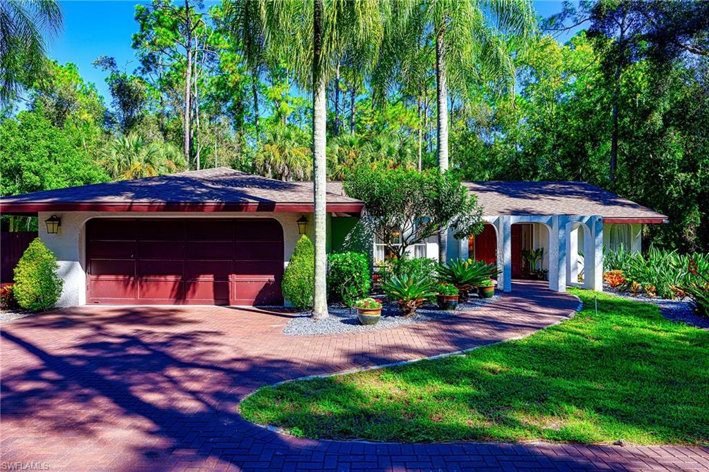 5675 Golden Oaks Ln, Naples, FL 34119 photo