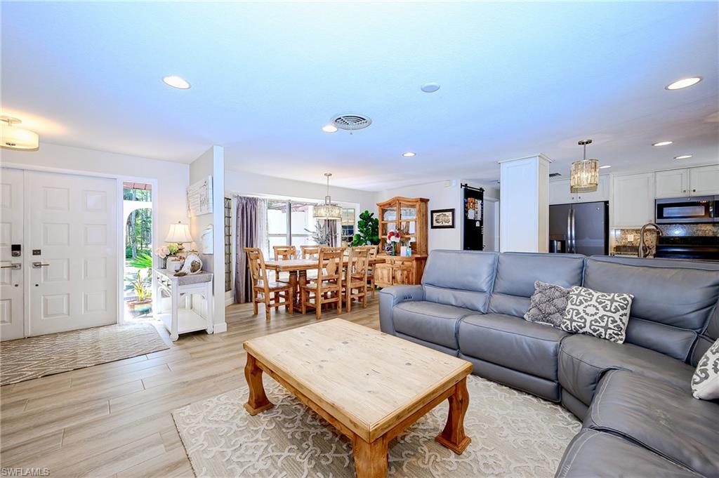 5675 Golden Oaks Ln, Naples, FL 34119 photo