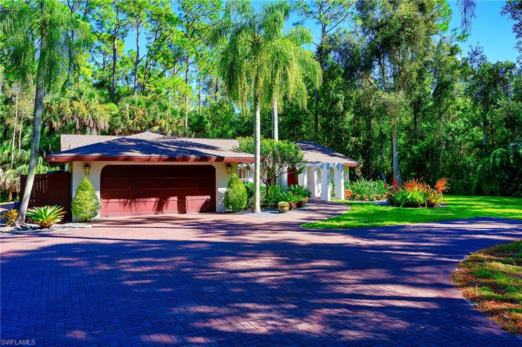 5675 Golden Oaks Ln, Naples, FL 34119 photo
