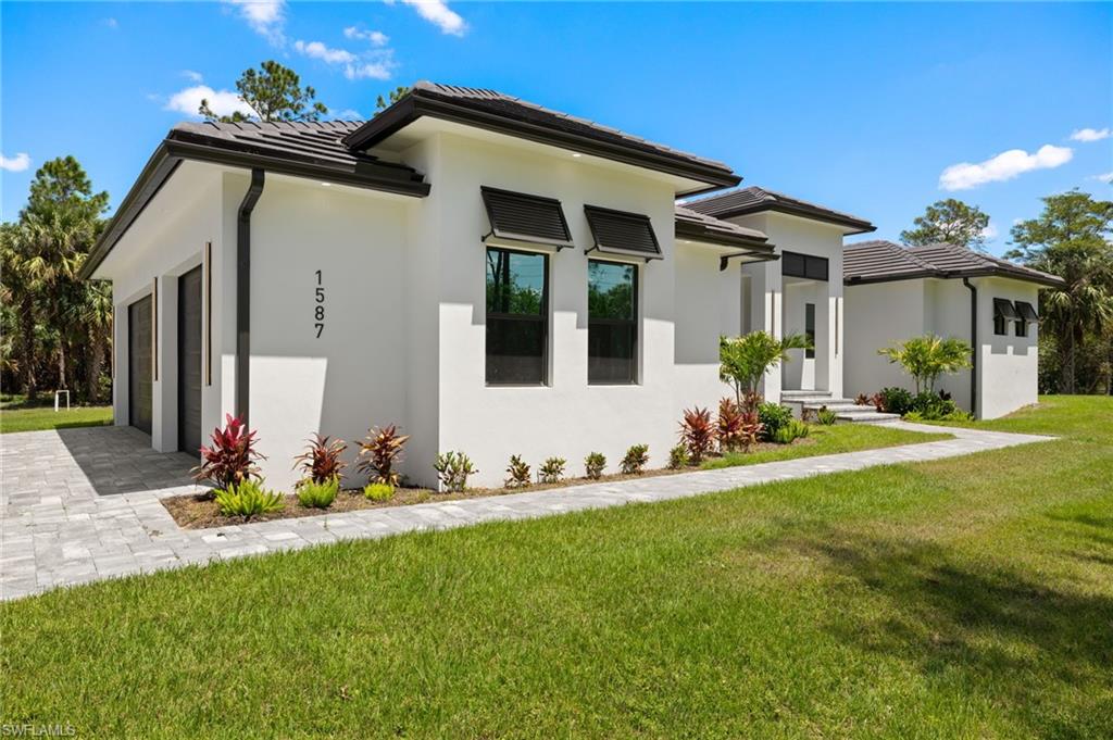 1587 Golden Gate Blvd, Naples, FL 34120 photo