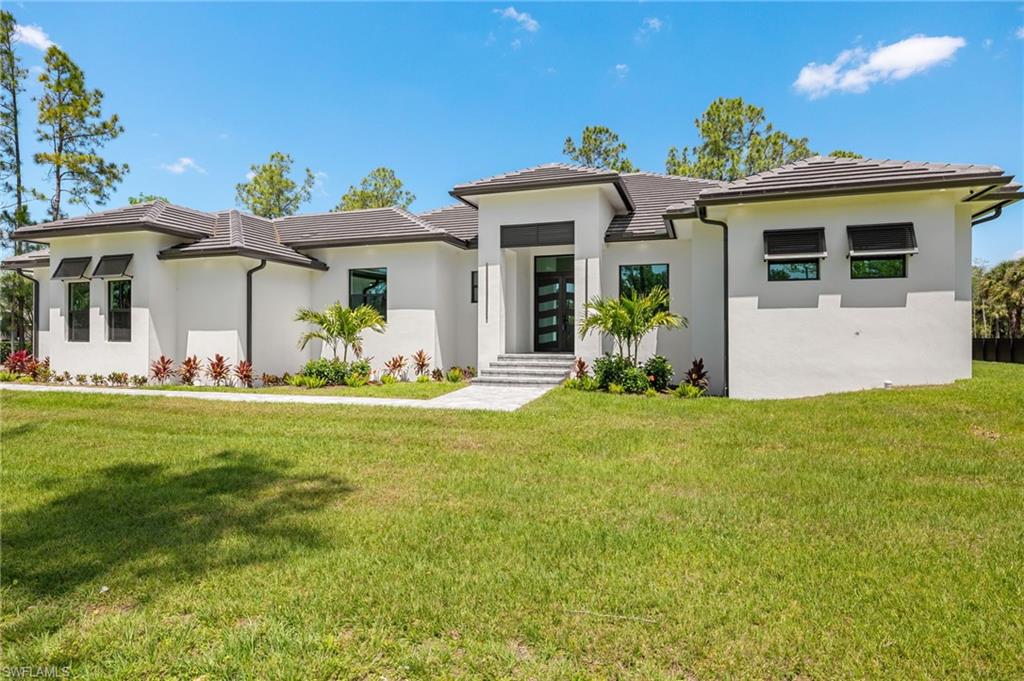 1587 Golden Gate Blvd, Naples, FL 34120 photo