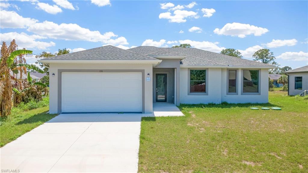 1134 Cumming St, Lehigh Acres, FL 33974