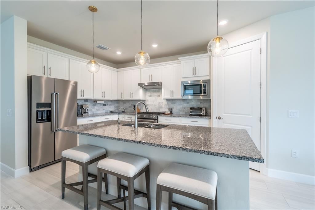 6727 Pennyroyal Dr, Naples, FL 34114 photo