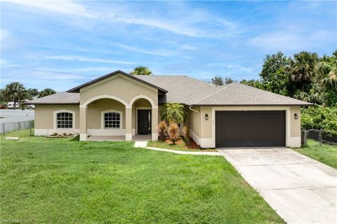 Single Family Residence in LEHIGH ACRES FL 157 Wanatah AVE.jpg