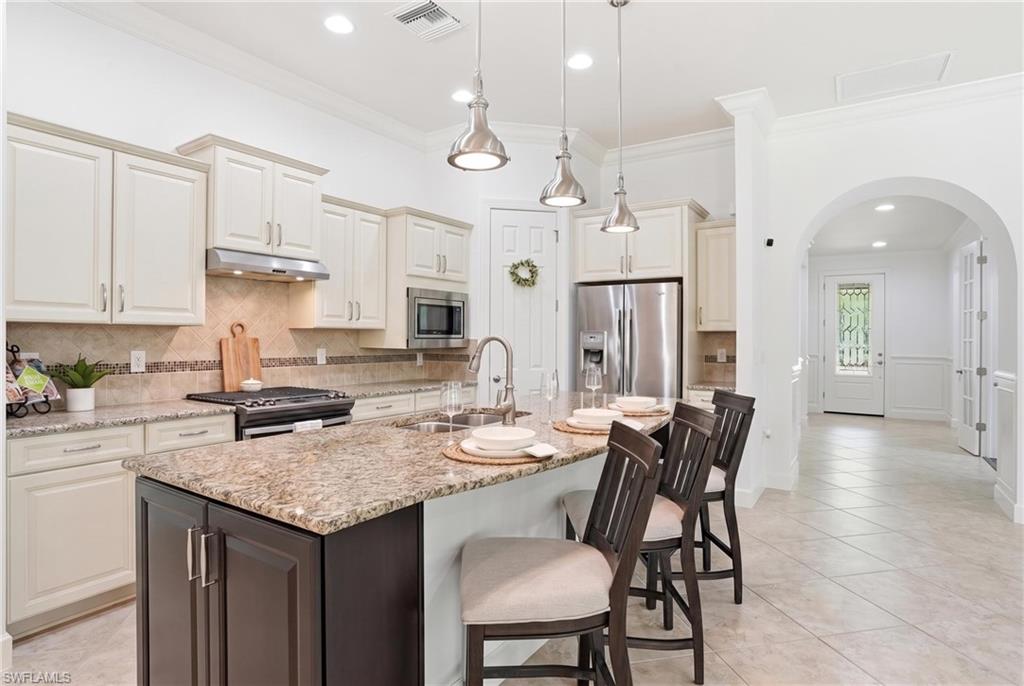 9436 Whooping Crane Way, Naples, FL 34120