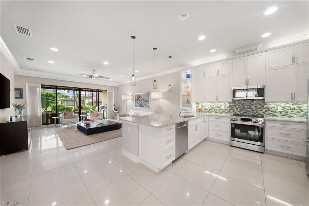 13617 Mandarin Cir, Naples, FL 34109 photo