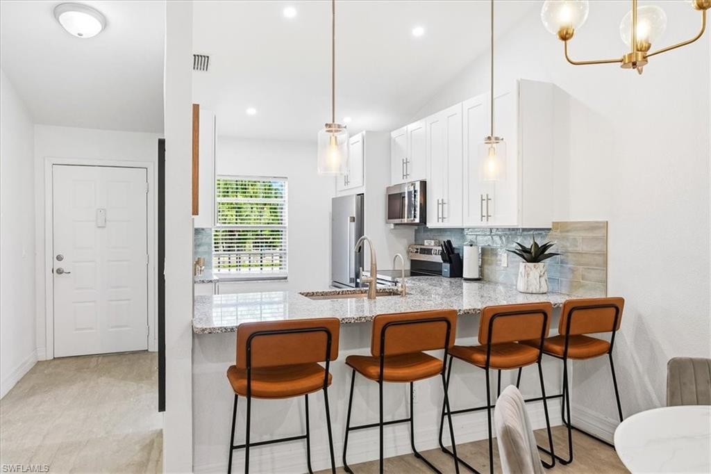 1714 Kings Lake Blvd #202, Naples, FL 34112 photo