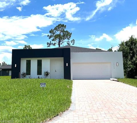 Single Family Residence in LEHIGH ACRES FL 1218 Eclat ST.jpg