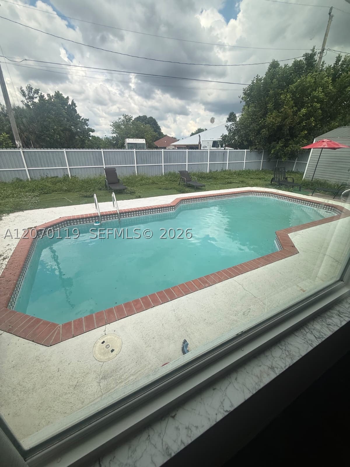 129 Lake Dr, Lehigh Acres, FL 33936
