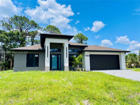 Single Family Residence in Lehigh Acres FL 1211 Gerald Ave.jpg