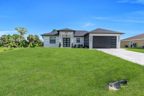 Single Family Residence in Lehigh Acres FL 813 Porter ST E St.jpg