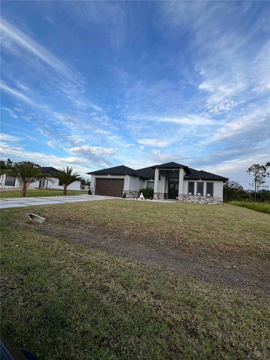 616 Maple Ave, Lehigh Acres, FL 33972 photo
