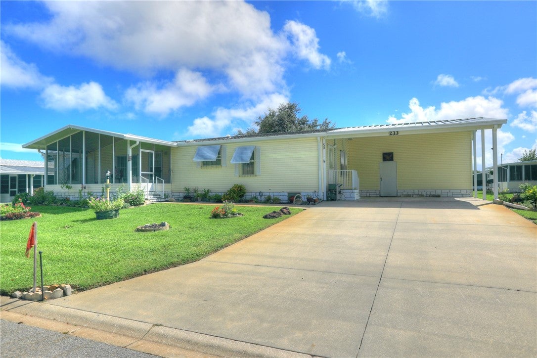 233 Kiwi Dr, Barefoot Bay, FL 32976 photo