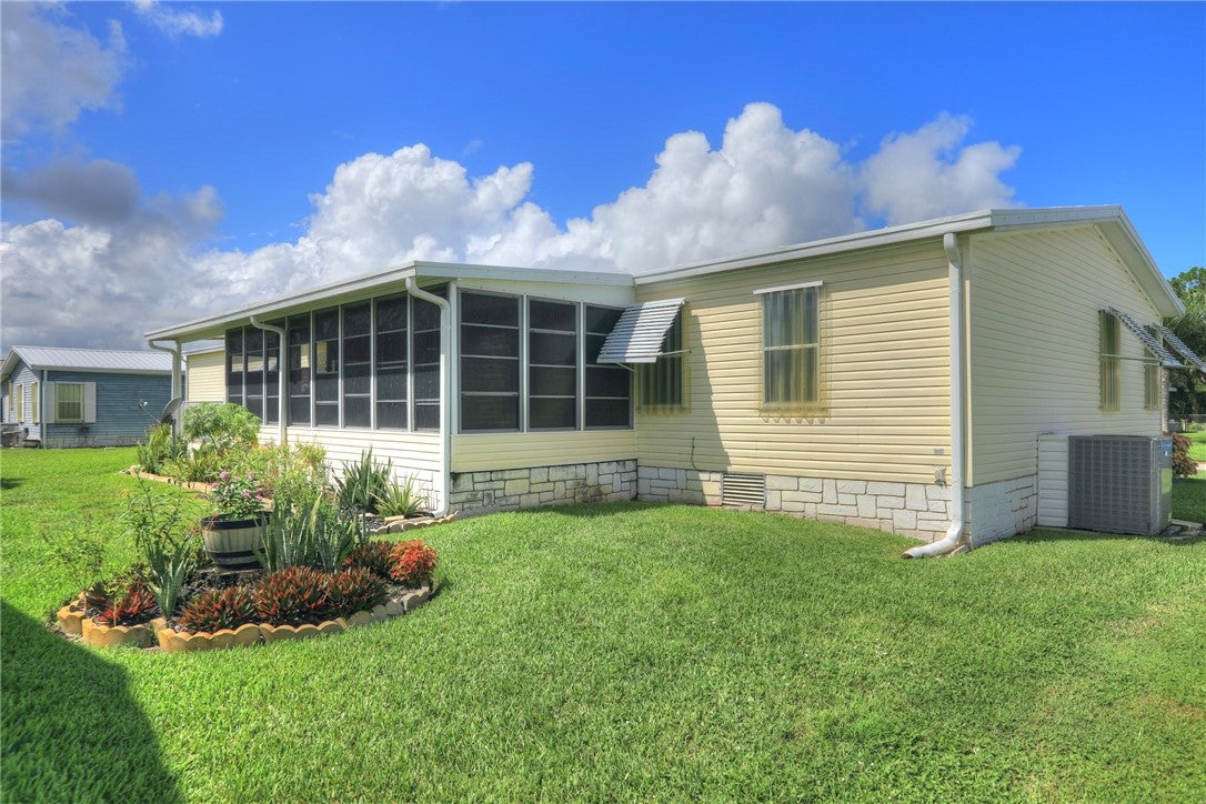 233 Kiwi Dr, Barefoot Bay, FL 32976 photo